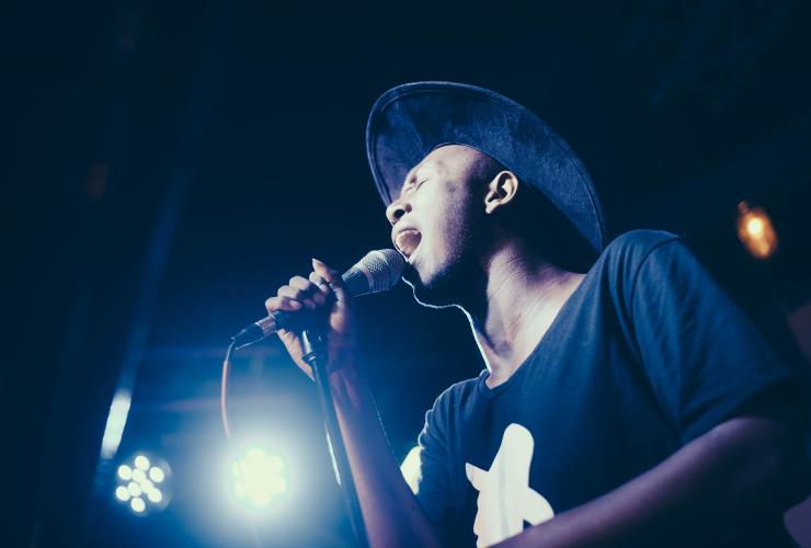 Check out the Fillmore R&B Festival Man singing into mic